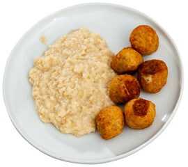 Delicious smoked spanish albondigas, meatballs cooked with oatmeal. Isolated over white background