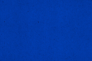 Bright blue paper texture with subtle fibers, perfect for backgrounds and creative design projects.