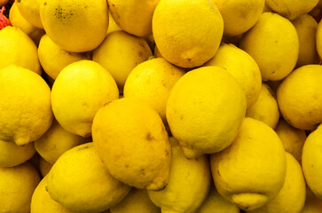 yellow pears on market stall