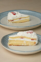 Japanese strawberry shortcake on each stylish large and small plate on a wooden table