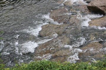 Image of strong waves in the clear water of Daecheongcheon