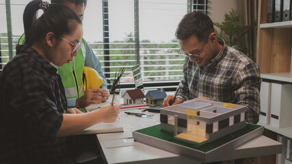 A meeting of architects who work hard together to create outstanding work. Engineers and contractors collaborate to solve problems that arise in design and construction.