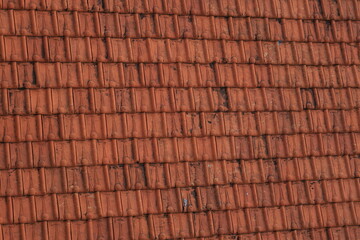 tile arrangement pattern on the roof of the house. tile pattern background. 
