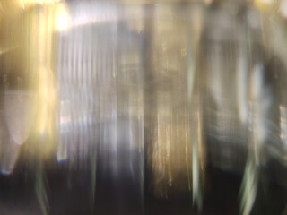 Bokeh background effect The atmosphere is very luxurious and precious. Glittering yellow gold diamonds fell. Contrasts beautifully with the black background.