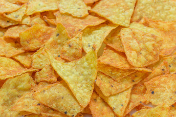 Yellow tortilla corn chips snacks background