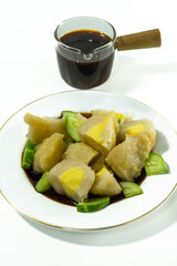 Pempek or mpek-mpek is a delicacy from Palembang, South Sumatra. It is made of fish and sago flours and served together with a dark, rich sauce called cuko.