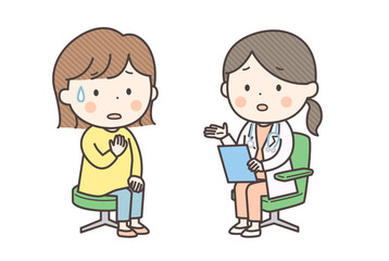 女性医師からの診断結果の説明に不安になる女性