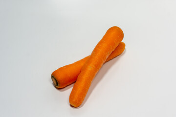 Carrots isolated. Carrot on white background. Three carrots. Full depth of field.