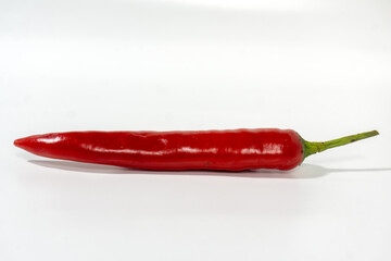 red hot chili peppers on white background. Chili spur pepper ( Cayenne pepper, long fed pepper,...