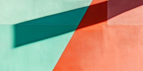 Shadow Play: Abstract teal and coral hues meet in a dynamic interplay of light and shadow.  Geometric shapes and contrasting colors create a visually striking image. 