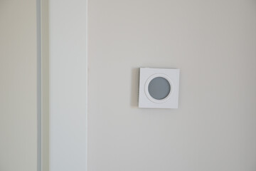  Smart Thermostat on White Wall for Optimal Home Temperature Control