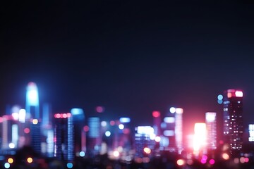 Blurred cityscape at night with colorful lights.