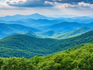 Fototapeta premium Serene mountain landscape with rolling hills and lush greenery under a cloudy sky.