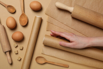Baking paper with kitchen utensils on the table