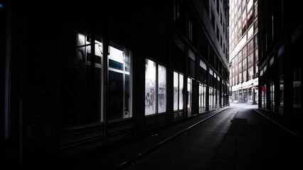 City street at night with broken windows and graffiti on walls, symbolizing urban violence and the impact of social issues on community environments.