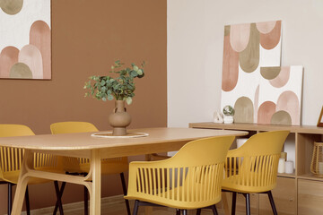 Dining table with chairs in modern room