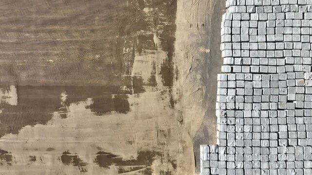 Top view of a warehouse of paving slabs. 