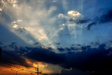Evening Sunlight From Clouds Blue Sky Background Landscape.