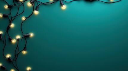 Twinkling string lights on a teal background for festive decoration.