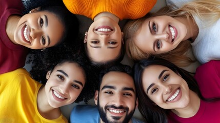 Obraz premium Diverse Group of Multiracial Young Women and Men Smiling and Connecting Together in a Friendly,Positive,and Inclusive Team or Community Setting