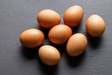 Brown Eggs on Slate Surface Kitchen Ingredient