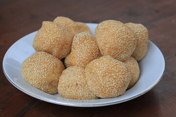 Onde-onde or sesame seed ball on a plate, popular traditional food in Indonesia
