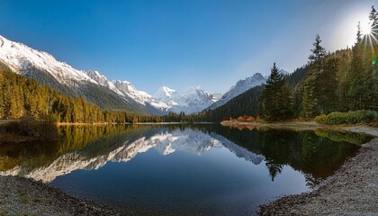 Serene Lake Nestled Between Snow-Capped Peaks and Lush Forests, Reflecting the Sunshine and Surrounding Scenery on Its Glassy Surface During Early Morning