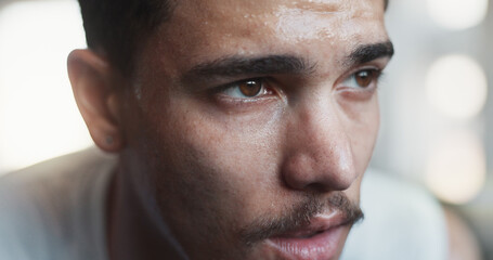 Gym, man and tired with sweat for fitness, cardio training and exhausted for health workout. Rest, male person and bodybuilder with thinking for exercise session, wellness recovery and commitment