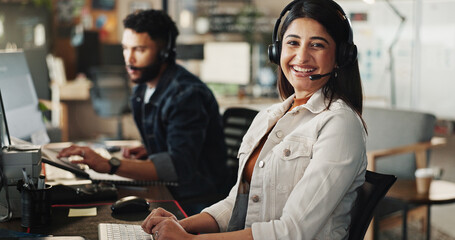 Business woman, portrait and consultant with headphones for desktop support, web or tech assistance at call center. Female person, agent or operator on computer with smile for online customer service