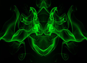 Movement of green smoke abstract on black background, darkness concept