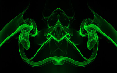 Movement of green smoke abstract on black background, darkness concept