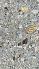 inclusions of granite chips in concrete, the texture of concrete, horizontal design on cement and concrete texture for pattern and background