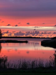 Fototapeta premium sunset over the river
