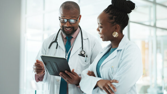Black people, doctors and happy on discussion with tablet at clinic for telehealth, schedule and appointment. Hospital, employees and healthcare team on meeting for patient data, results and report