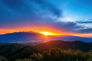 Breathtaking sunset over the mountains with vibrant colors and sunbeams