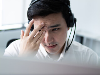 Stressed employee handling customer queries office environment work context remote viewpoint mental...