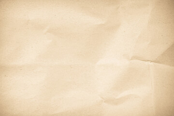 Crumpled brown paper texture background for design with copy space for text or image.