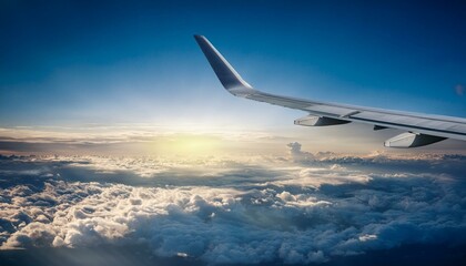 Airplane in the sky over a cloudy sky