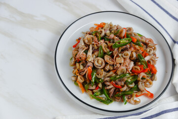 stir-fried salted squid with green chili. Perfect for recipe, article, catalogue, or any commercial purposes. with copy space.