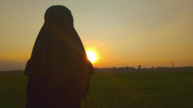 Little girl walking playground in sunset