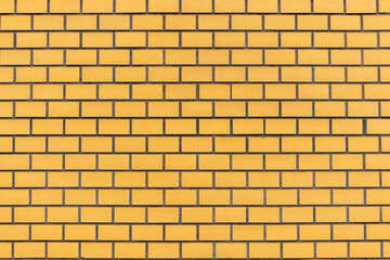 The wall of a brick house built of red brick. natural texture of masonry. design background