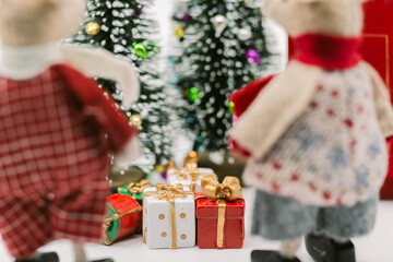 Mouse Figurines Gazing at Christmas Trees and Presents