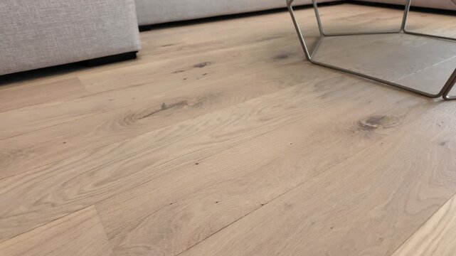New laminate flooring. Laminated parquet with brown wooden texture