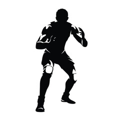 Fototapeta premium A man is standing in a boxing ring. He is wearing a black shirt and black pants. He is holding his hands up in the air