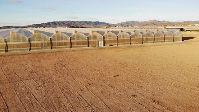 Aerial view of spanish coast view with commercial greenhouses. Industrial agriculture.  Mediterranean region of Mazarron, Sierra de las Moreras in Murcia Spain.
