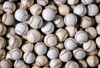 Top view of a pile of many baseball, close-up sports objects