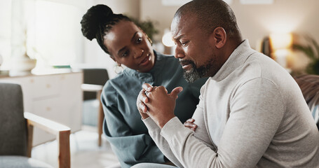 Sad, black man and stress with therapist for empathy, therapy session or mental health appointment. African, male person or patient crying with psychologist for counselling, support or consolidation