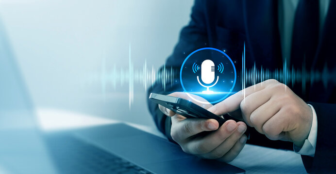 Voice recording and voice search concept.Sound recording or voice search with ai, speaker, music, voice message,assistance and marketing.Person using smartphone with virtual microphone.
