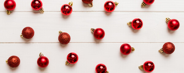 Christmas composition. a pattern of christmas balls on colored background. Flat lay, top view New year decor