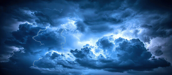 Obraz premium dramatic stormy sky filled with dark clouds and flashes of lightning creates intense atmosphere. swirling clouds evoke sense of power and natures fury